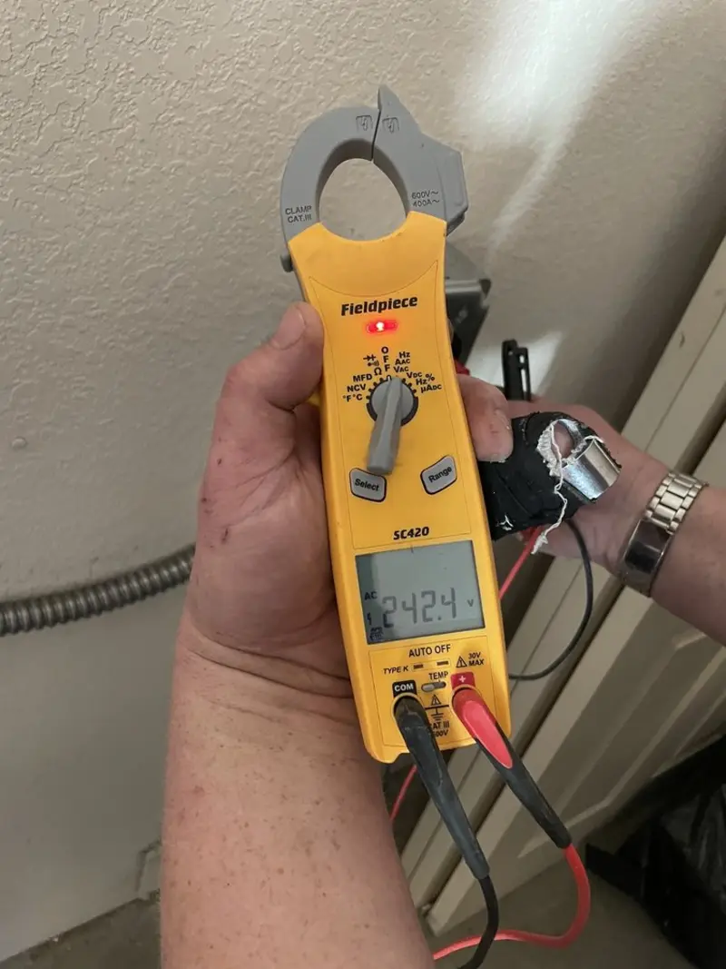 Voltage testing with clamp meter during Circuit Breaker Repair in Jeffersontown
